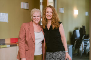 Two women posing for photo